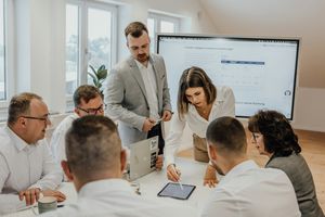 team meeting around a desk 